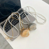 Shop Metal Shell Crossbody Mini Bag in color Golden, Silvery Grey in Pakistan
