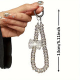 Shein Rhinestone Bow Hand Chain Wrist chain for mobile or air pod