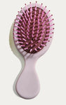 SHEIN 1pc Oval Mini Portable Hair Brush Plastic Detangler, ,For Women Men